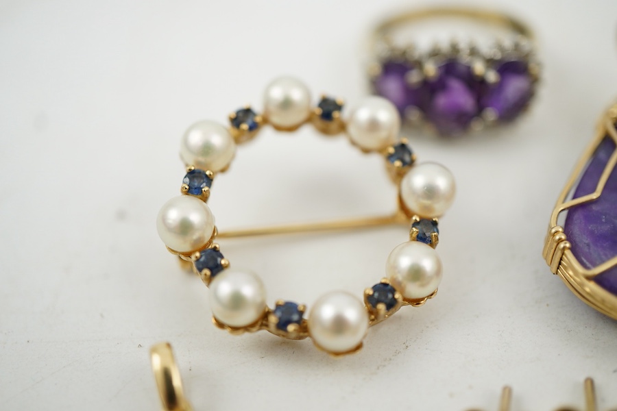 A collection of jewels, comprising: two amethyst and diamond rings; a cultured pearl and circular-cut sapphire wreath brooch; a fire opal pendant, one stone deficient; and a pair of cultured pearl earrings, all mounted i